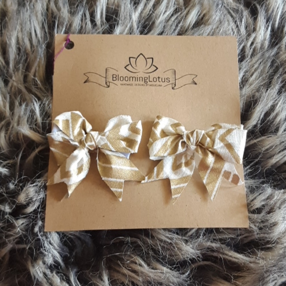 Golden pigtail clips